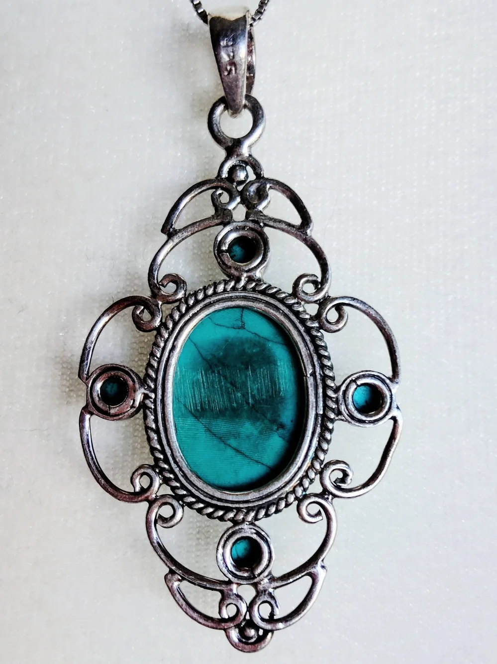 Genuine Turquoise Oval Pendant in Silver Plated  Setting